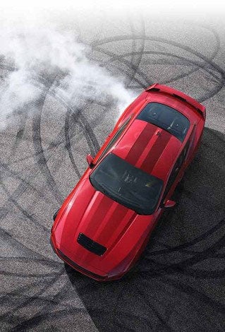 Overhead view of a 2024 Ford Mustang® model with tire tracks on pavement | All Star Ford in Denham Springs LA